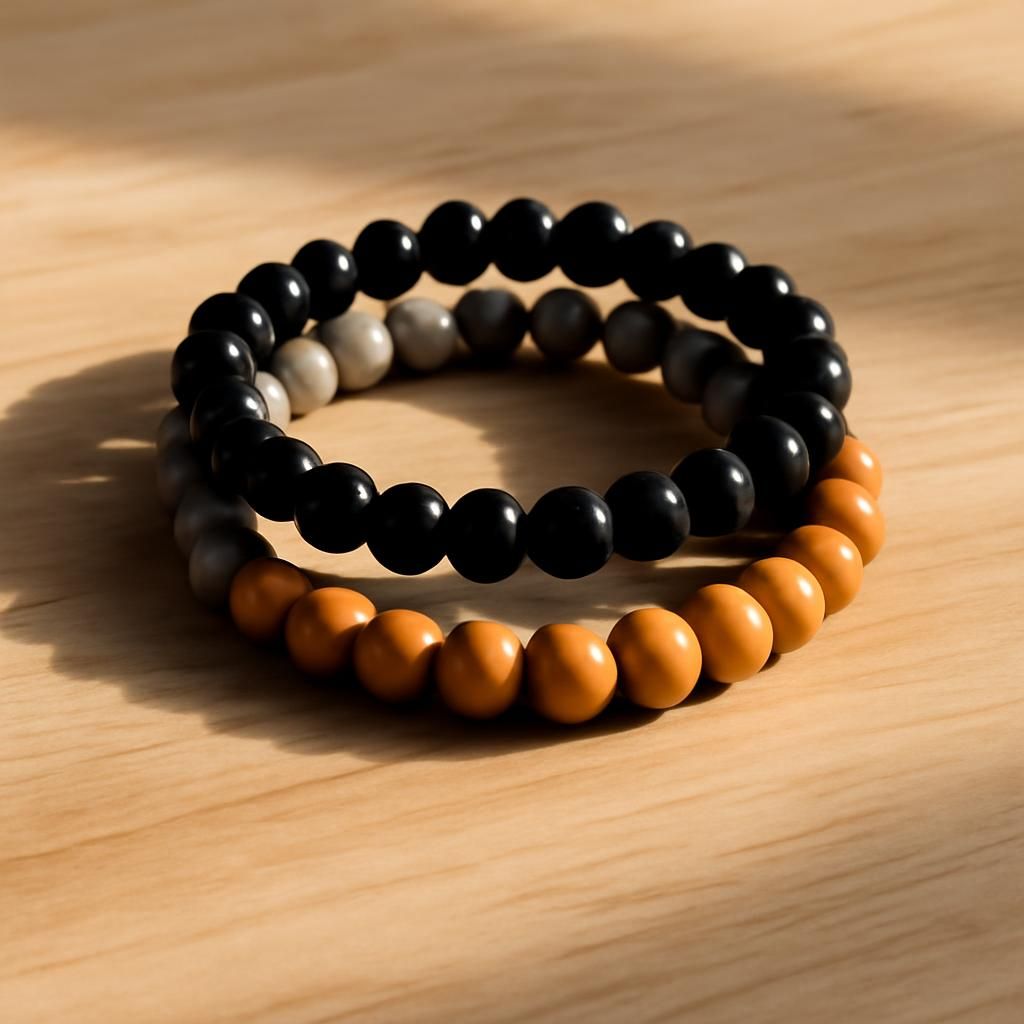 découvrez la signification des couleurs des bracelets en perles, du noir au gris en passant par le bois, et choisissez celui qui reflète au mieux votre style et vos émotions.